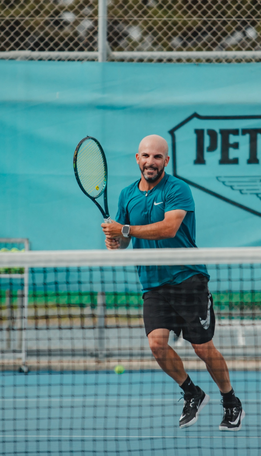 professional-tennis-player-performs-forehand-hit-on-clay-tennis-court-young-male-athlete